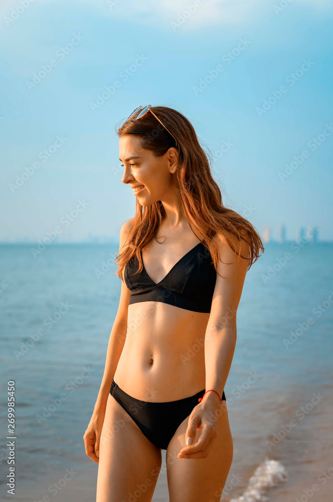 Beautiful girls in bikini on the beach Beautiful girls in bikini on the beach