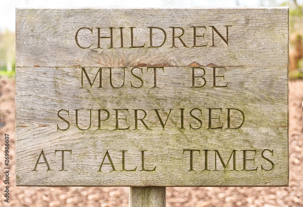Wooden children must be supervised sign Wooden children must be supervised sign