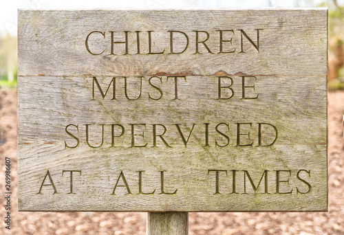 Wooden children must be supervised sign