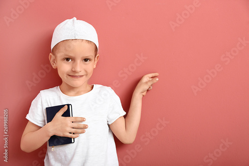 Little Muslim boy with Kora...