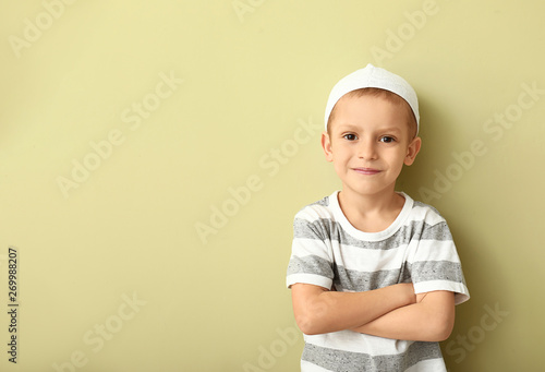 Little Muslim boy on color ...