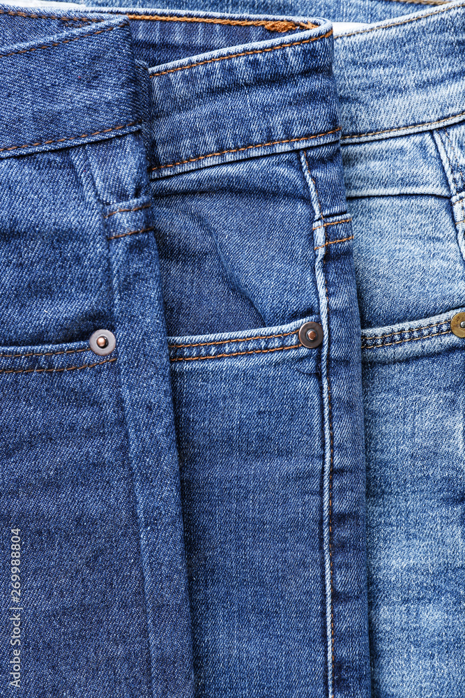 Different stylish jeans, closeup view Different stylish jeans, closeup view