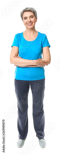 Sporty mature woman on whit...