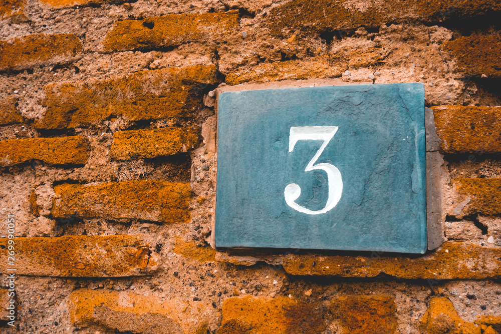 ancient door sign with number 3 ancient door sign with number 3