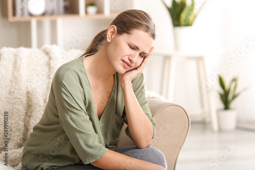 Young woman suffering from ...