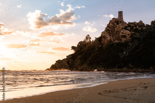 Sardinia seashore and cliffs at sunset