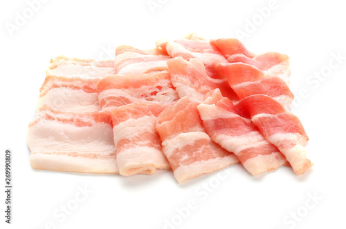 Raw bacon strips on white background