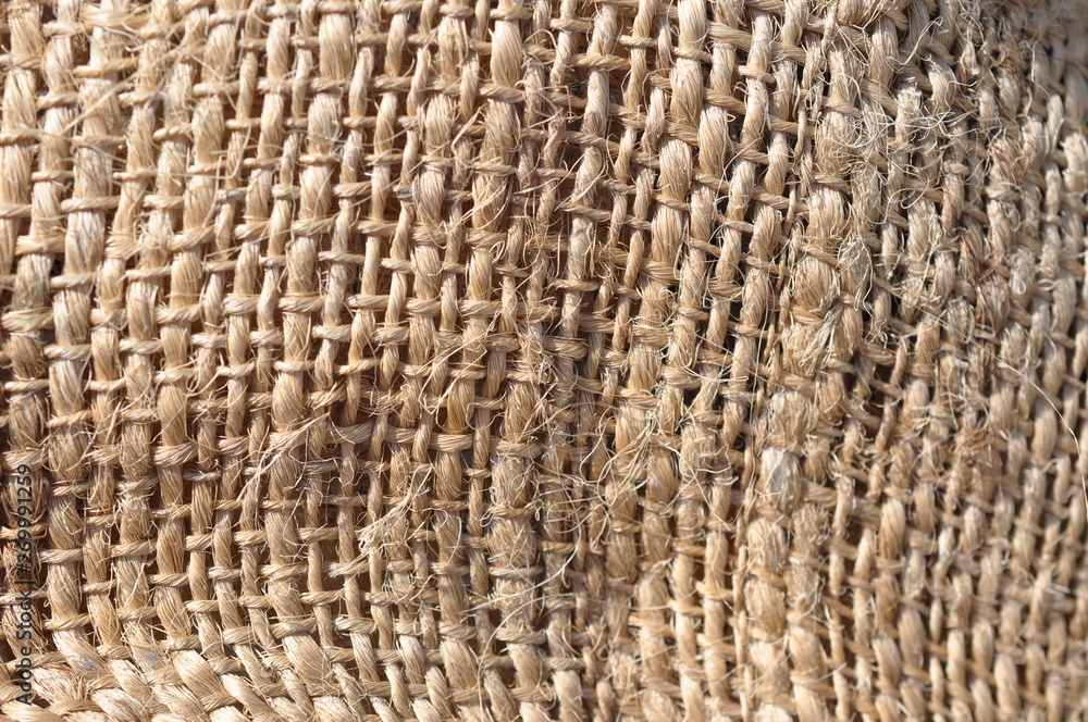 Partially view of a brown bag that was made of natural fibers. Partially view of a brown bag that was made of natural fibers.