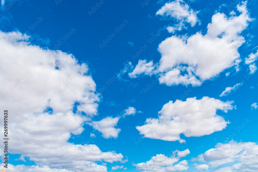 Blue sky with small clouds