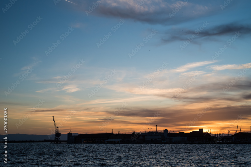 Thessaloniki port silhouette at sunset