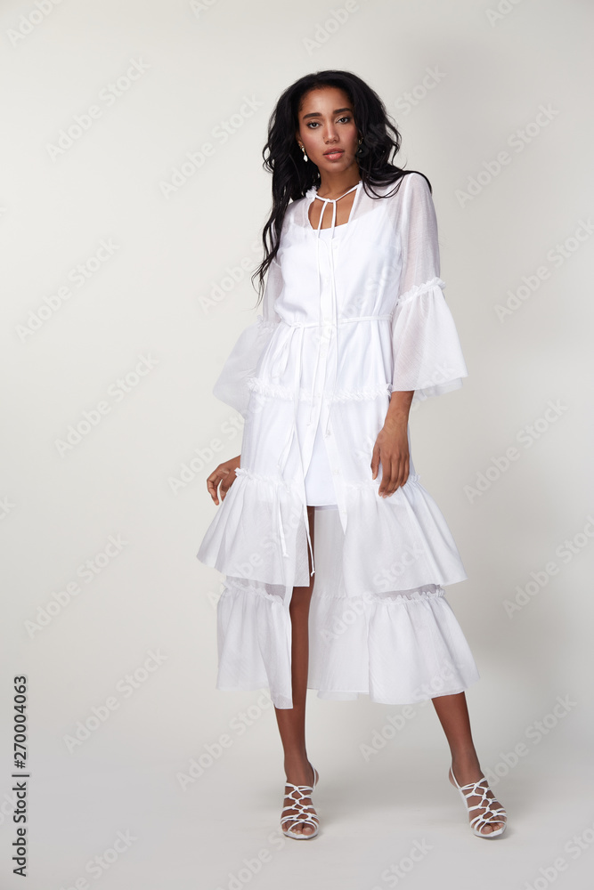 Beautiful sexy woman makeup wear fashion summer collection clothes casual style party office dress code slim body pretty face model pose accessory jewelry brunette hair interior room white wall bride.