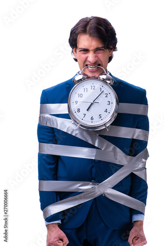 Young tied employee in time management concept  photo