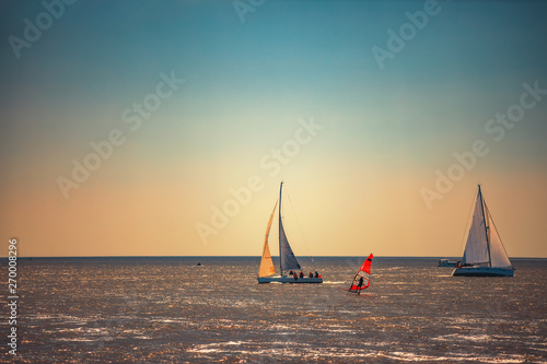 Sailing ship yacht with white sails in the sea