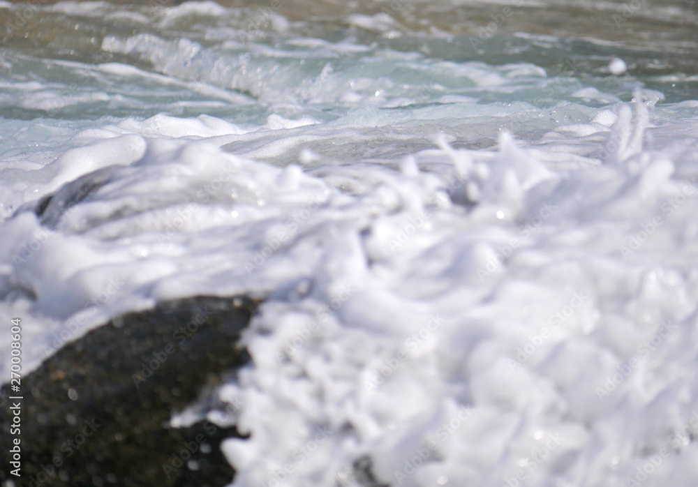 Waves crashing against the rock Waves crashing against the rock