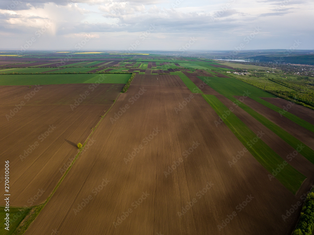 Flight over cultivating field in the spring. Moldova Republic of.