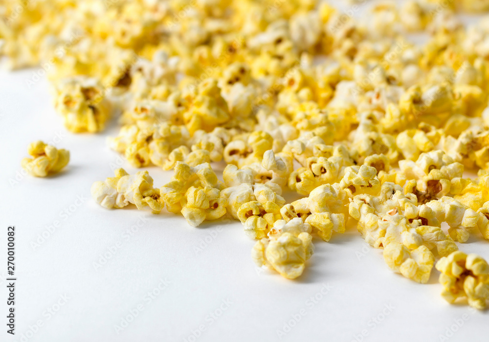 Popcorn at white background. Flat lay, top view Popcorn at white background. Flat lay, top view
