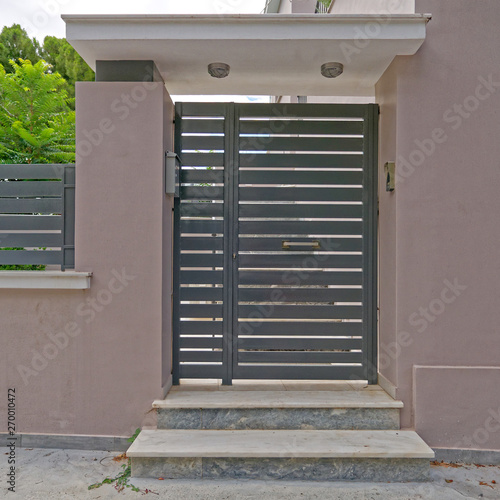 contemporary house entrance metalic graey door photo