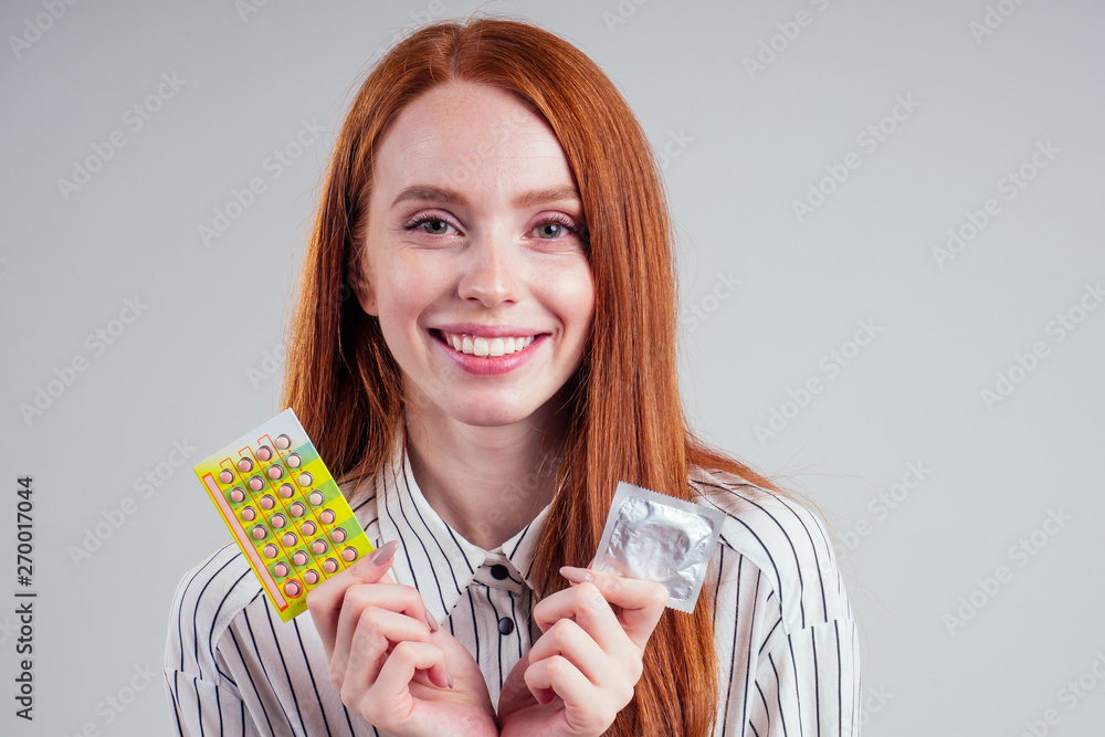 Φωτογραφία picture of young redhead be lost in thought businesswoman in striped shirt with