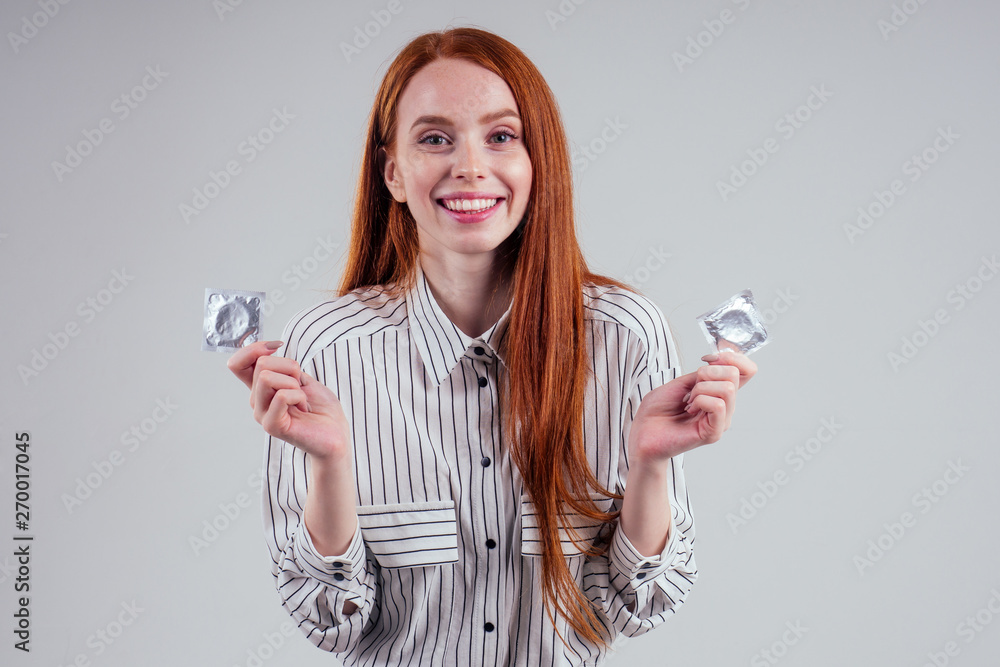 Φωτογραφία picture of young redhead be lost in thought businesswoman in striped shirt with