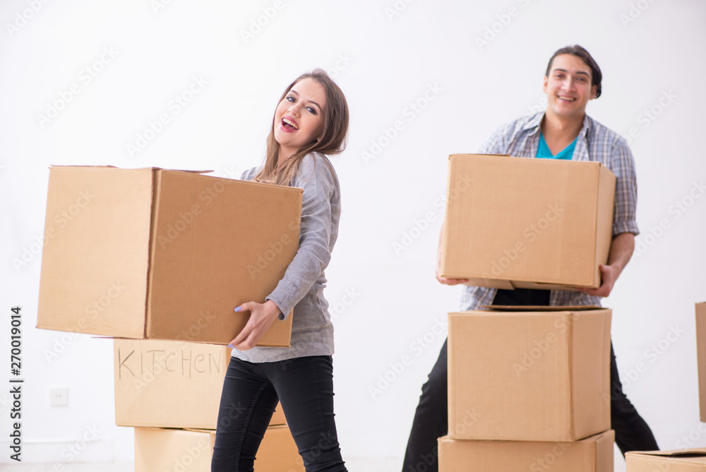 Young pair moving to new flat Young pair moving to new flat