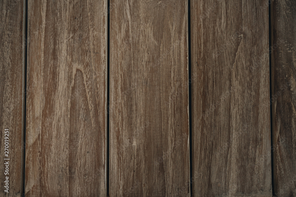 Naklejka premium Brown wood vertical texture natural tree background