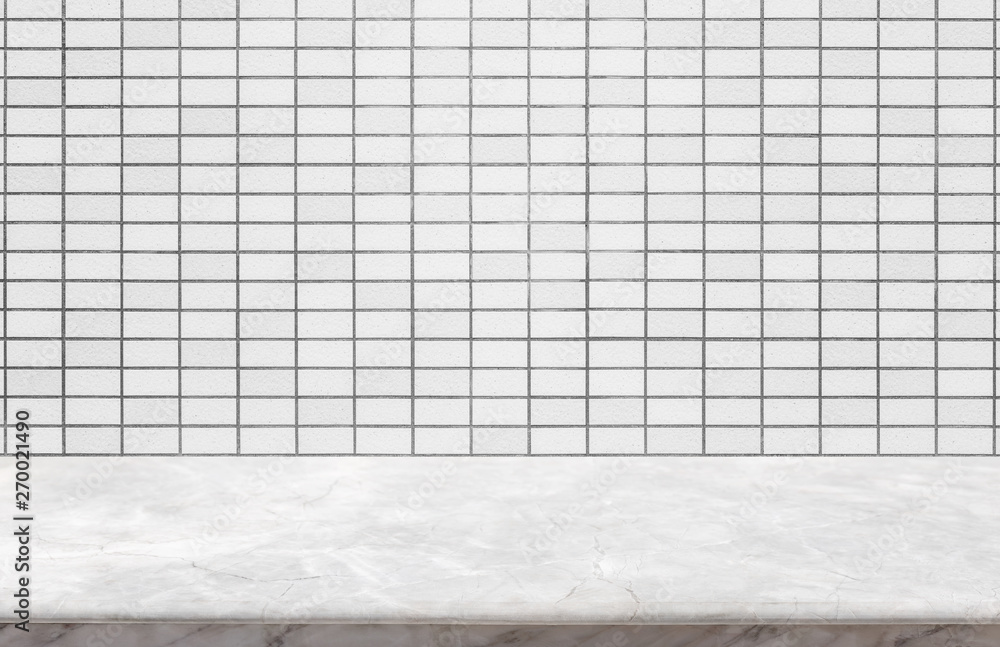 Empty white marble stone table top and background of grey granite stone tile wall - can used for display or montage your products. Empty white marble stone table top and background of grey granite stone tile wall - can used for display or montage your products.