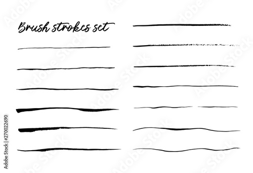 Ink brush strokes set isolated on white vector photo