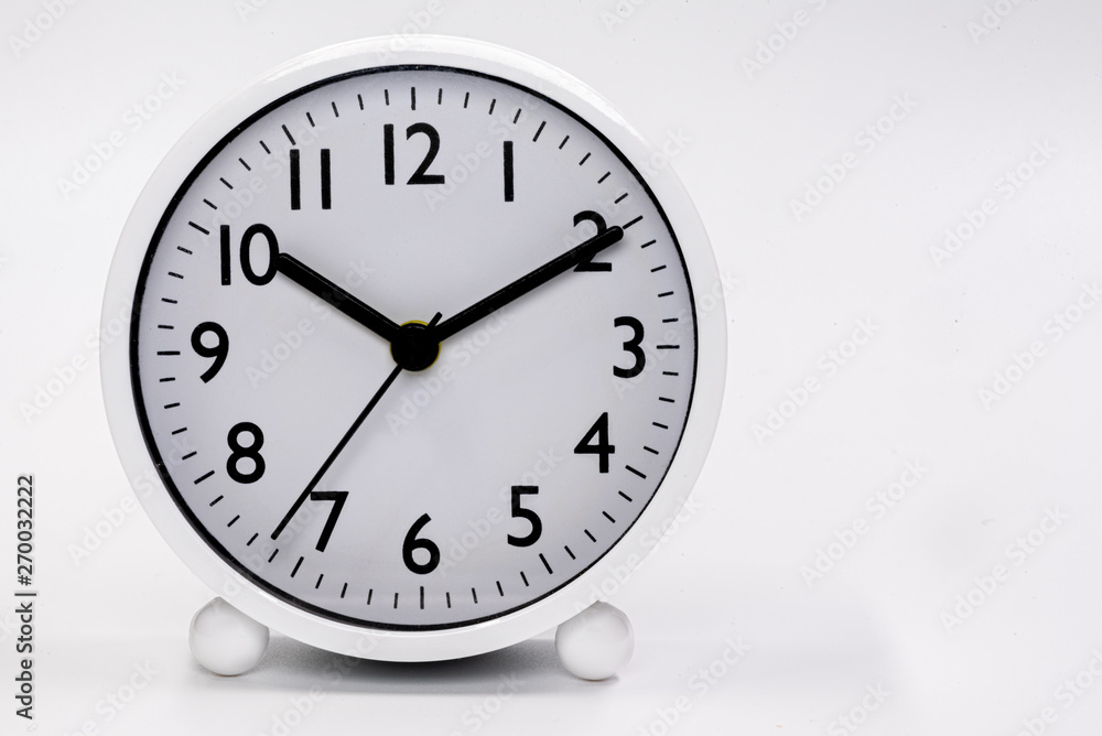 White alarm clock isolated in white background White alarm clock isolated in white background