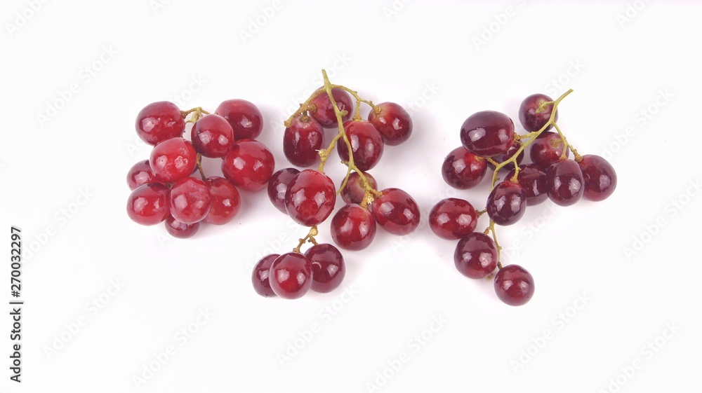 Red grapes isolated on white background Red grapes isolated on white background
