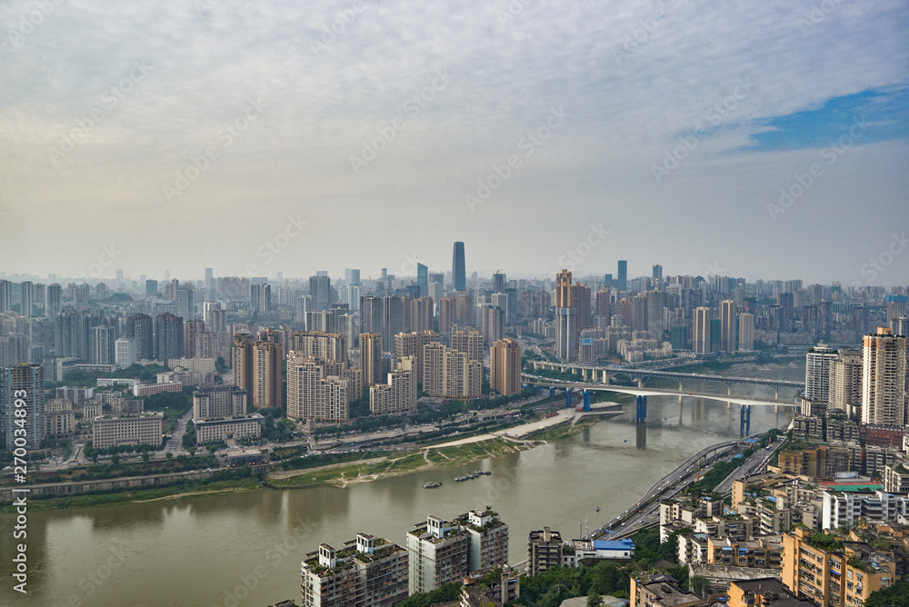 Fototapeta premium Cityscape along the Yangtze River in Jialing River, Chongqing, China
