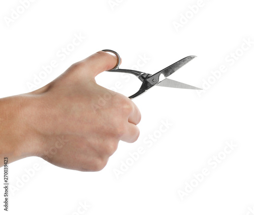 Man holding pair of sewing scissors isolated on white, closeup