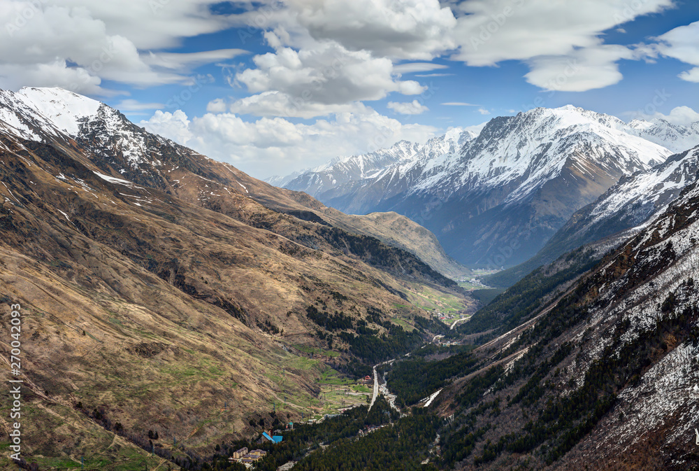 Fototapeta premium Panoramic view of snowy mountains.