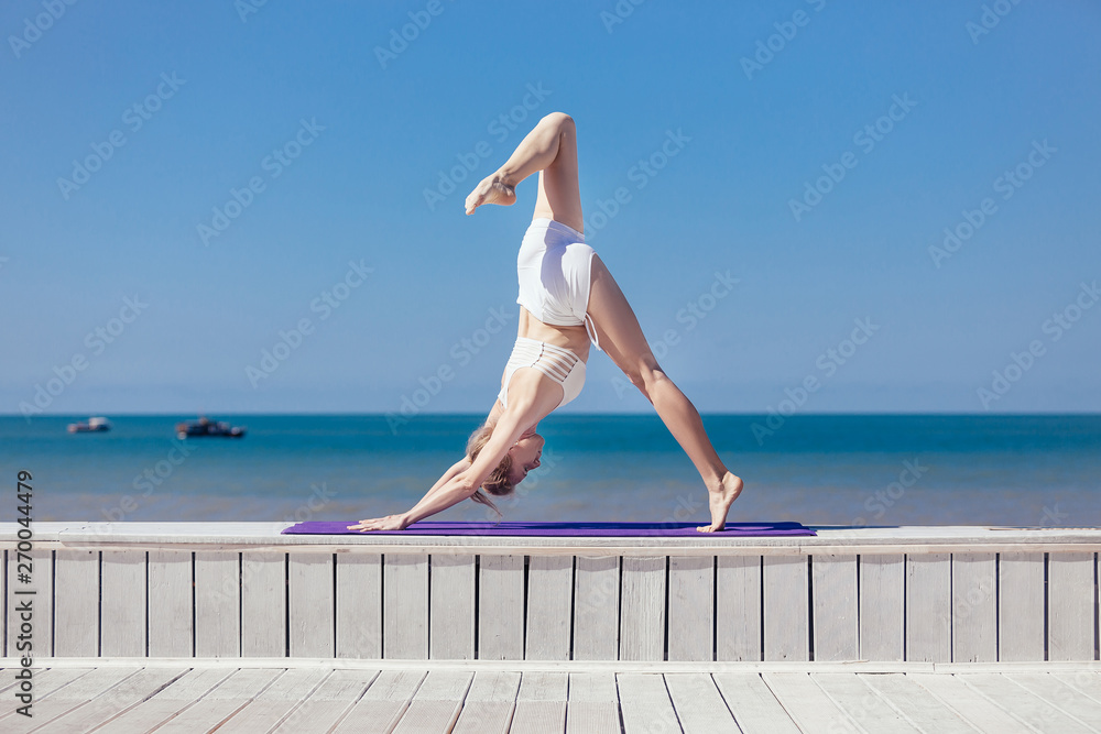 Little Girl Stands In One Of The Yoga Poses Stock Photo, Picture