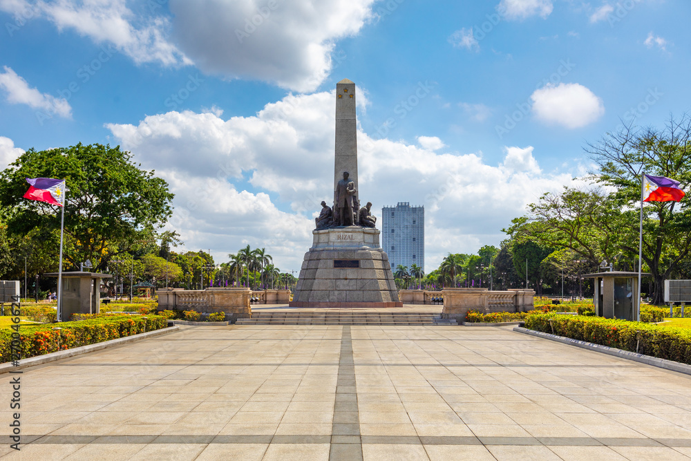 Manila, Philippines - April 5, 2019: rizal park (Luneta) and Rizal Monument - obrazy, fototapety, plakaty 