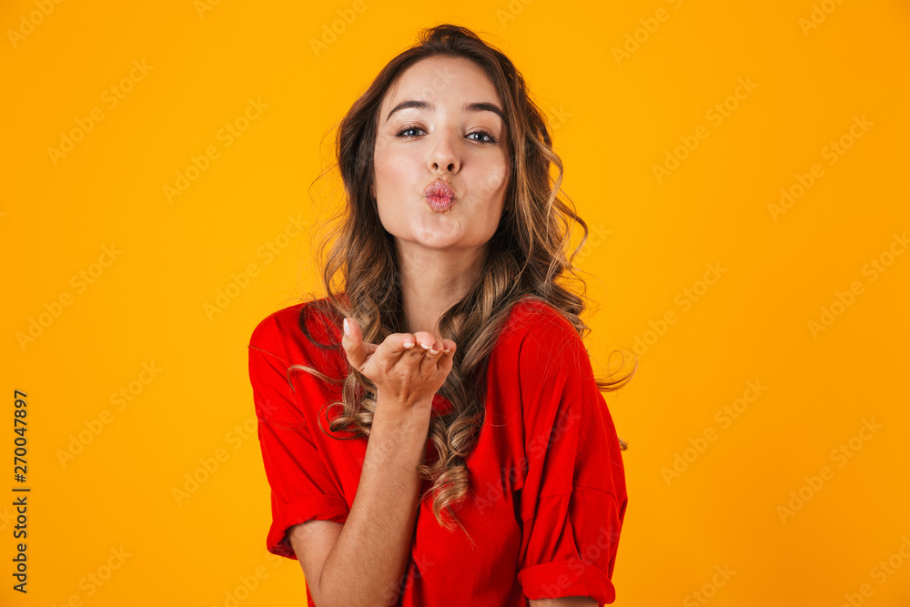 Portrait of a lovely cheerful young woman standing Portrait of a lovely cheerful young woman standing