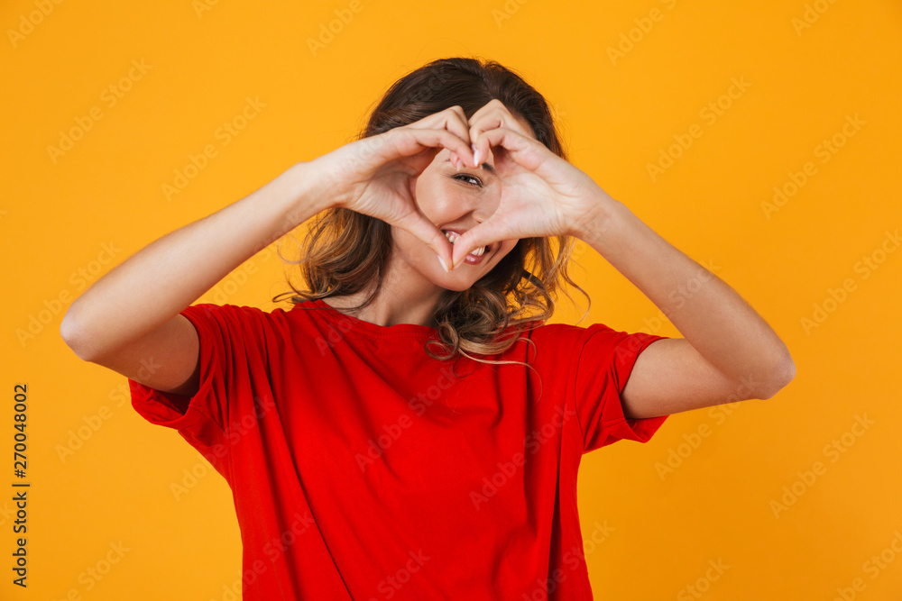 Portrait of a lovely cheerful young woman standing Portrait of a lovely cheerful young woman standing