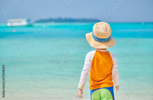 Three year old toddler boy on beach. Summer family vacation at Maldives. © haveseen