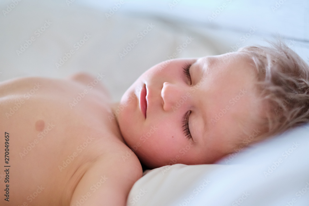 Three year old toddler boy sleeping on pillow Three year old toddler boy sleeping on pillow