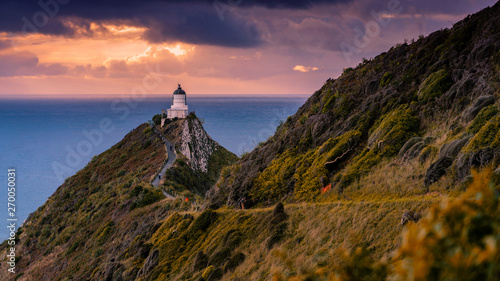 The Sunrise of Nugget Point Lighthouse photo