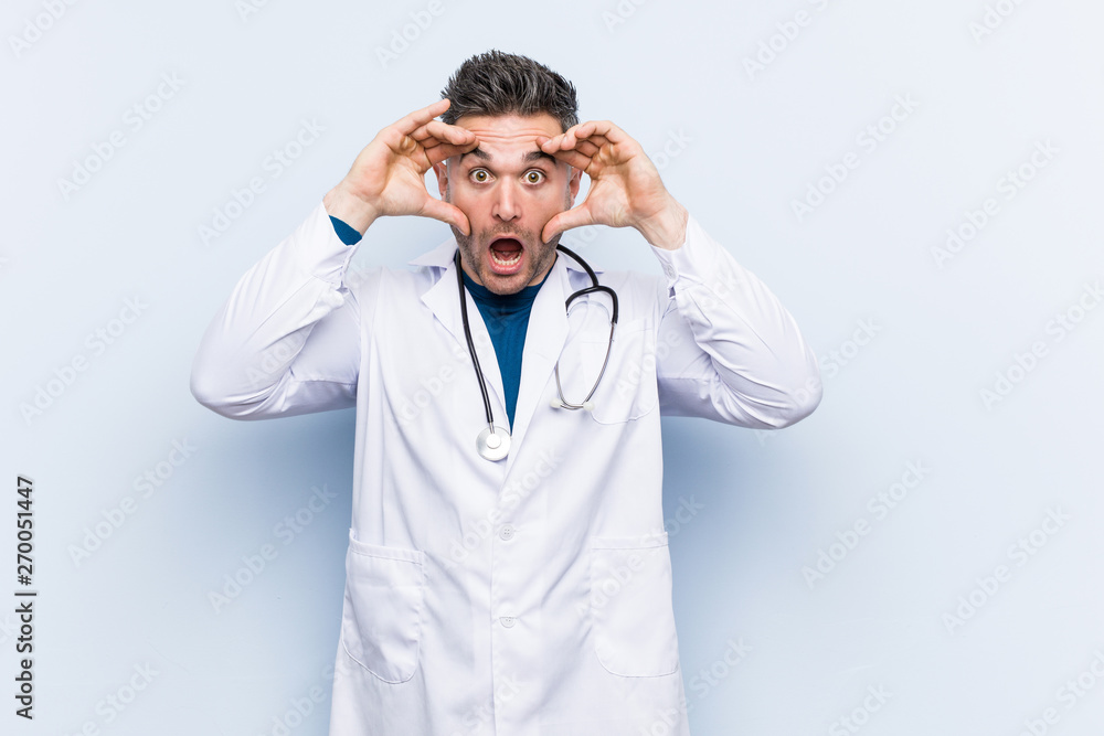 Young handsome doctor man keeping eyes opened to find a success opportunity. Young handsome doctor man keeping eyes opened to find a success opportunity.