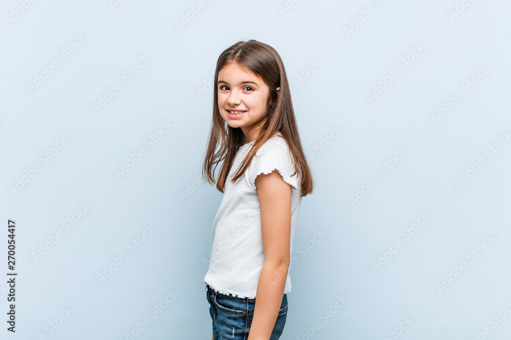 Cute girl looks aside smiling, cheerful and pleasant. Cute girl looks aside smiling, cheerful and pleasant.