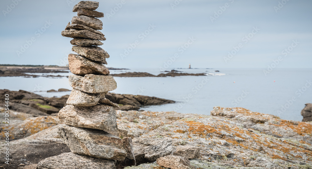 cairn on a hiking trail on the island of Yeu