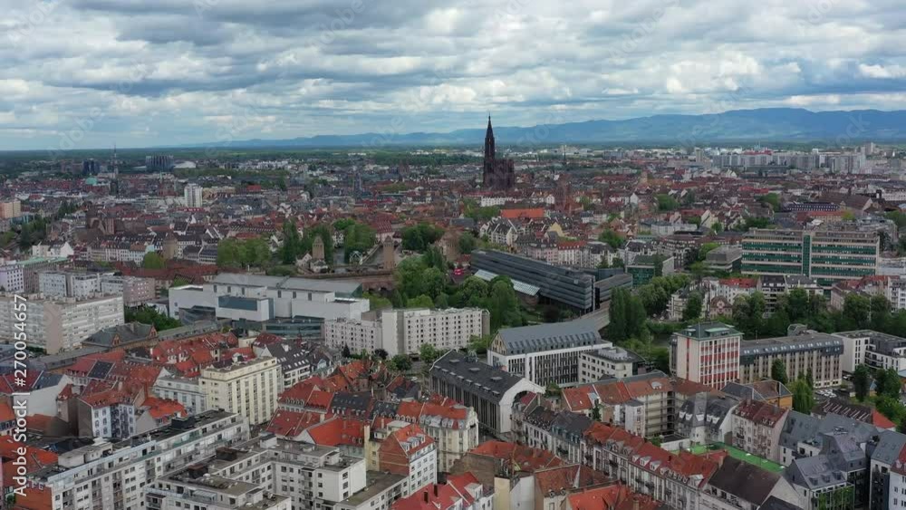 Aerial view of cityscape of Strasbourg, historic center of city, gothic Cathedral Notre-Dame de Strasbourg, historic stone bridge & dam Barrage Vauban - landscape panorama of France from above, Europe Aerial view of cityscape of Strasbourg, historic center of city, gothic Cathedral Notre-Dame de Strasbourg, historic stone bridge & dam Barrage Vauban - landscape panorama of France from above, Europe