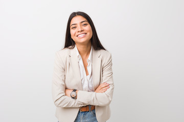 Young business arab woman isolated against a white background laughing and having fun.
