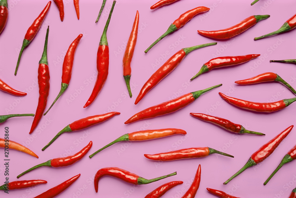 Red hot chilli pepper on purple background Red hot chilli pepper on purple background