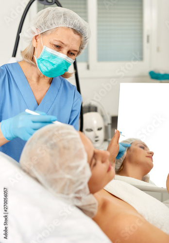 Woman getting ready for plastic surgery