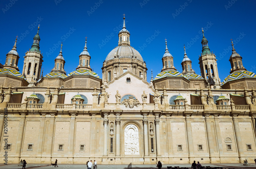 Zaragoza, Aragon, Spain, 2019 : Baroque facade of the Basilica of Our Lady of the Pillar at  Plaza del Pilar square. It is reputed to be the first church dedicated to Mary in history. 