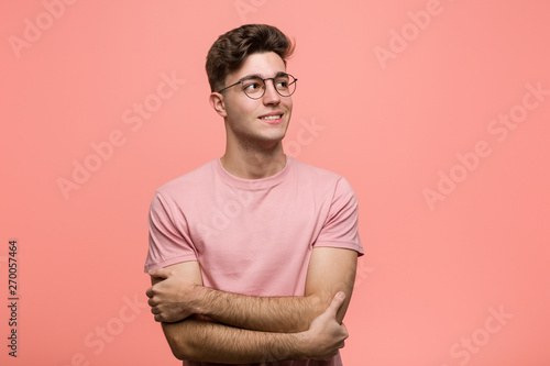 Young cool caucasian man smiling confident with crossed arms. © Asier