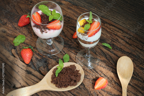 Beautiful food set of layer of milk Yogurt with topping by strawberry and brown cracker