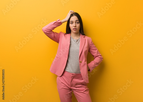 Young modern business woman worried and overwhelmed